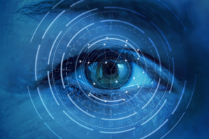 Close-up of an eye overlaid with digital scanning graphics representing retinal screening